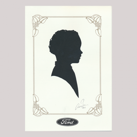 
        Front of silhouette, with boy in frame looking right.